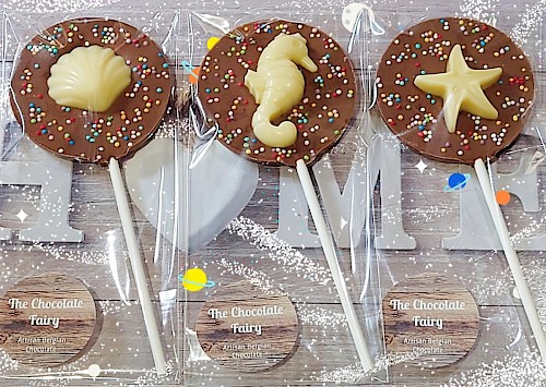 Milk chocolate 'seaside' lollipops